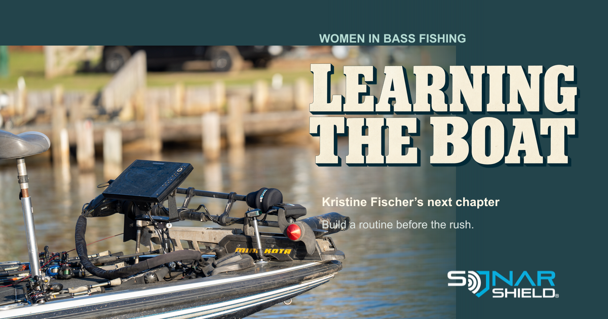Sonar Shield library photograph of an unoccupied bass-boat bow and electronics with Learning the Boat lettering; not Kristine Fischer’s boat or equipment.