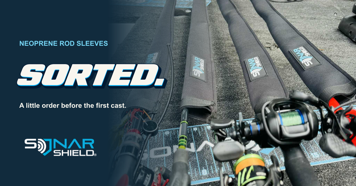 Four Sonar Shield neoprene sleeves fitted over fishing rods on a boat deck, with SORTED lettering and the official Sonar Shield logo.